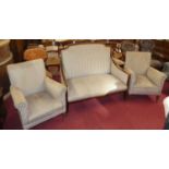 An Edwardian mahogany and floral striped upholstered two-seat parlour settee, w.121cm; together with