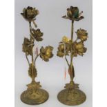 A pair of Art nouveau brass floral candlesticks, h.31cm