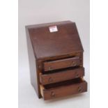 An early 20th century oak apprentice bureau, h.27cm