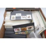 A collection of vintage stamps and first day covers