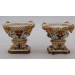A pair of 19th century Derby imari urns, h.10cm