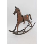 A 20th century iron miniature rocking horse, h.49cmFloor to tip of head is 48cm. Rocker approx