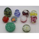 A collection of glass paperweights (10)