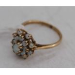 A 9ct gold opal flowerhead cluster ring, 2.5g, size M/N