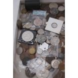 A collection of British and world coinage, to include a 1951 crown coin,1956 silver Canadian half