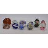 A collection of glass paperweights (10)