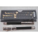 A Graf von Faber-Castell Classic fountain pen and ballpoint pen duo, in ridged black with steel