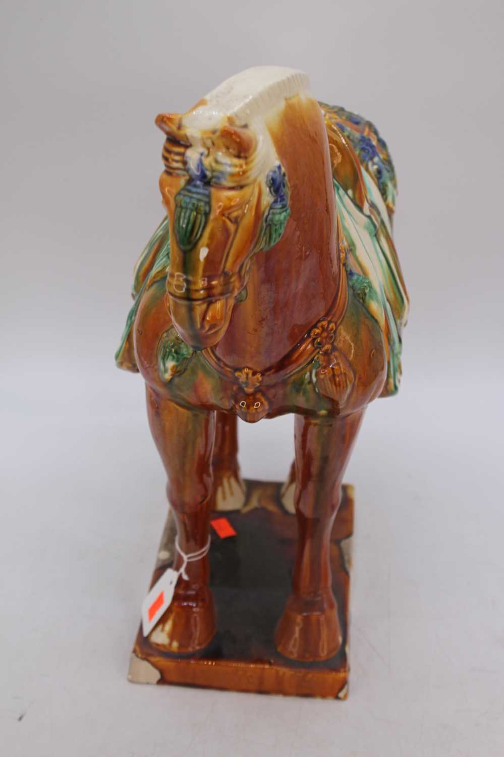 A Chinese Tang style sancai glazed earthenware mode of a horse, h.43cm - Bild 2 aus 3