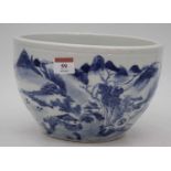A Chinese blue and white stoneware jardiniere, decorated with a mountain landscape, h.