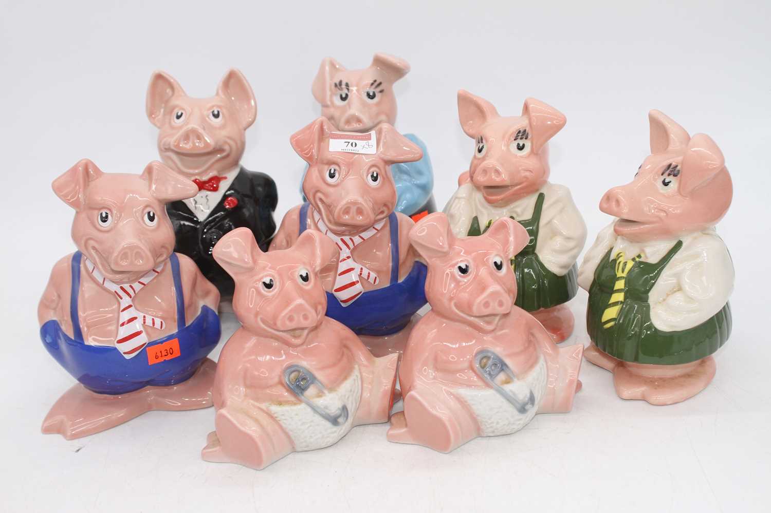 A set of eight Wade Natwest piggy-banks, the largest h.20cm