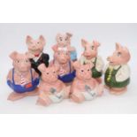 A set of eight Wade Natwest piggy-banks, the largest h.20cm