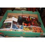 Three boxes of graphic novels and annuals