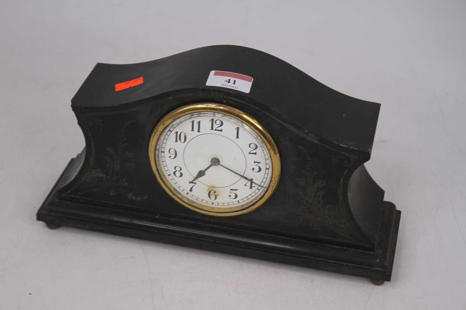 An early 20th century black slate mantel clock, the dial showing Arabic numerals, h.14cm