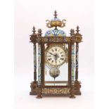 A 20th century cloisonne enamel eight-day mantel clock, the enamelled dial showing Roman numerals,