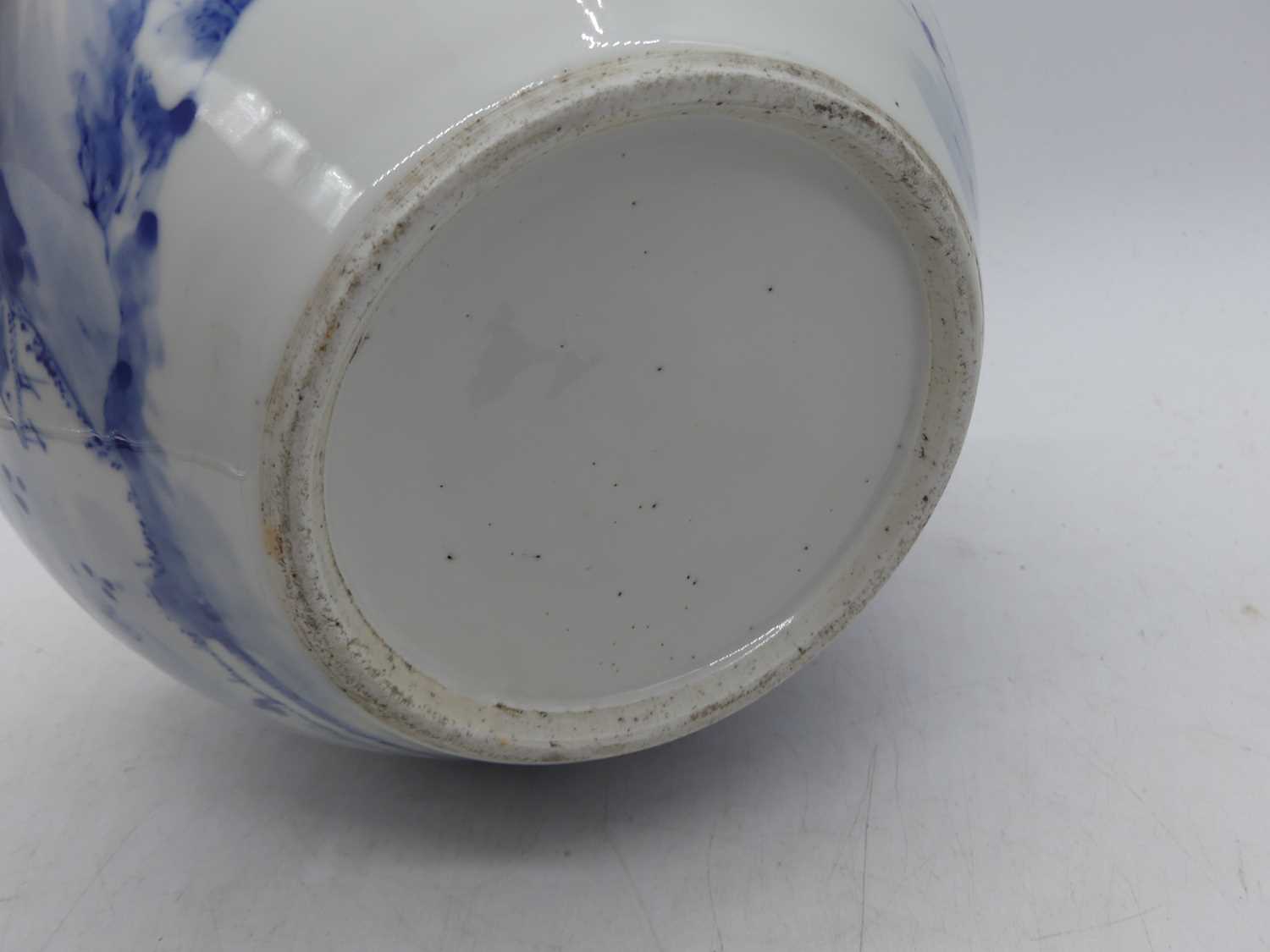 A Chinese blue and white stoneware jardiniere, decorated with a mountain landscape, h. - Bild 10 aus 10
