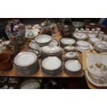 A Royal Worcester dinner service, decorated with floral swags