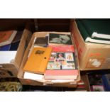 A collection of vintage stamp albums and contents