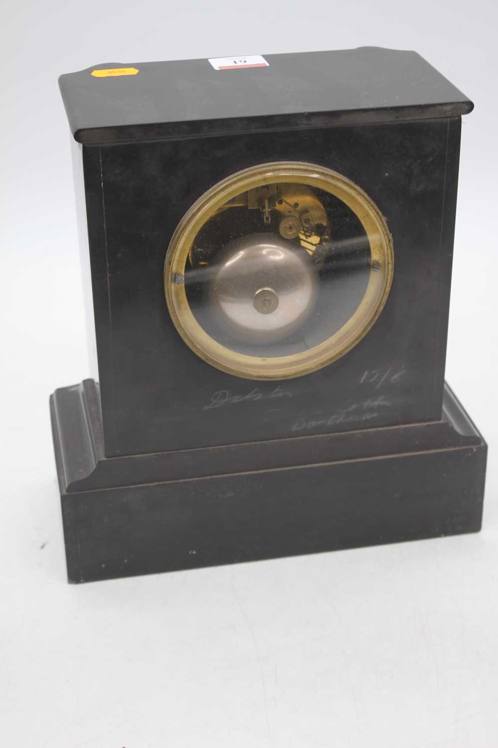 A Victorian black slate mantel clock, the enamelled chapter ring showing Roman numerals, the eight- - Bild 2 aus 3