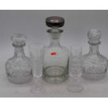 A pair of crystal mallet shaped decanters, h.23cm; together with a whisky decanter; and two drinking