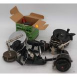 A collection of vintage fishing reels, to include Steelite and Penn