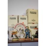 A Guinness advertising mantel clock, h.24cm; together with six Guinness advertising figures (7)