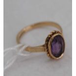 A 9ct gold and amethyst set dress ring, assayed Birmingham 1972, 2.8g, size L