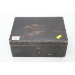 A Japanese lacquered box, w.25cm, containing a collection of cigarette cards