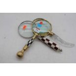 Three table magnifying glasses