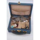 A collection of jewellery to include an enamel decorated buckle, cameo brooches, earrings etc