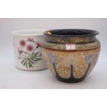 A Royal Doulton stoneware jardiniere, tube-line decorated with flowers, h.19cm; together with a