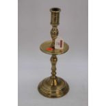 An 18th century Heemskerk style brass candlestick, h.34cm