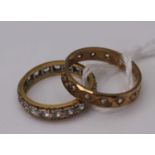 A 9ct gold cz set eternity ring (one stone missing), 1.8g, size K; and one other stamped 18ct, 2.