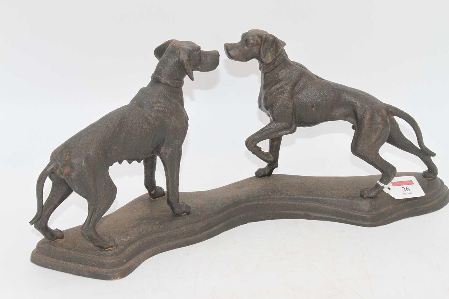 A 20th century cast metal group of two dogs, h.21cm