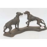 A 20th century cast metal group of two dogs, h.21cm