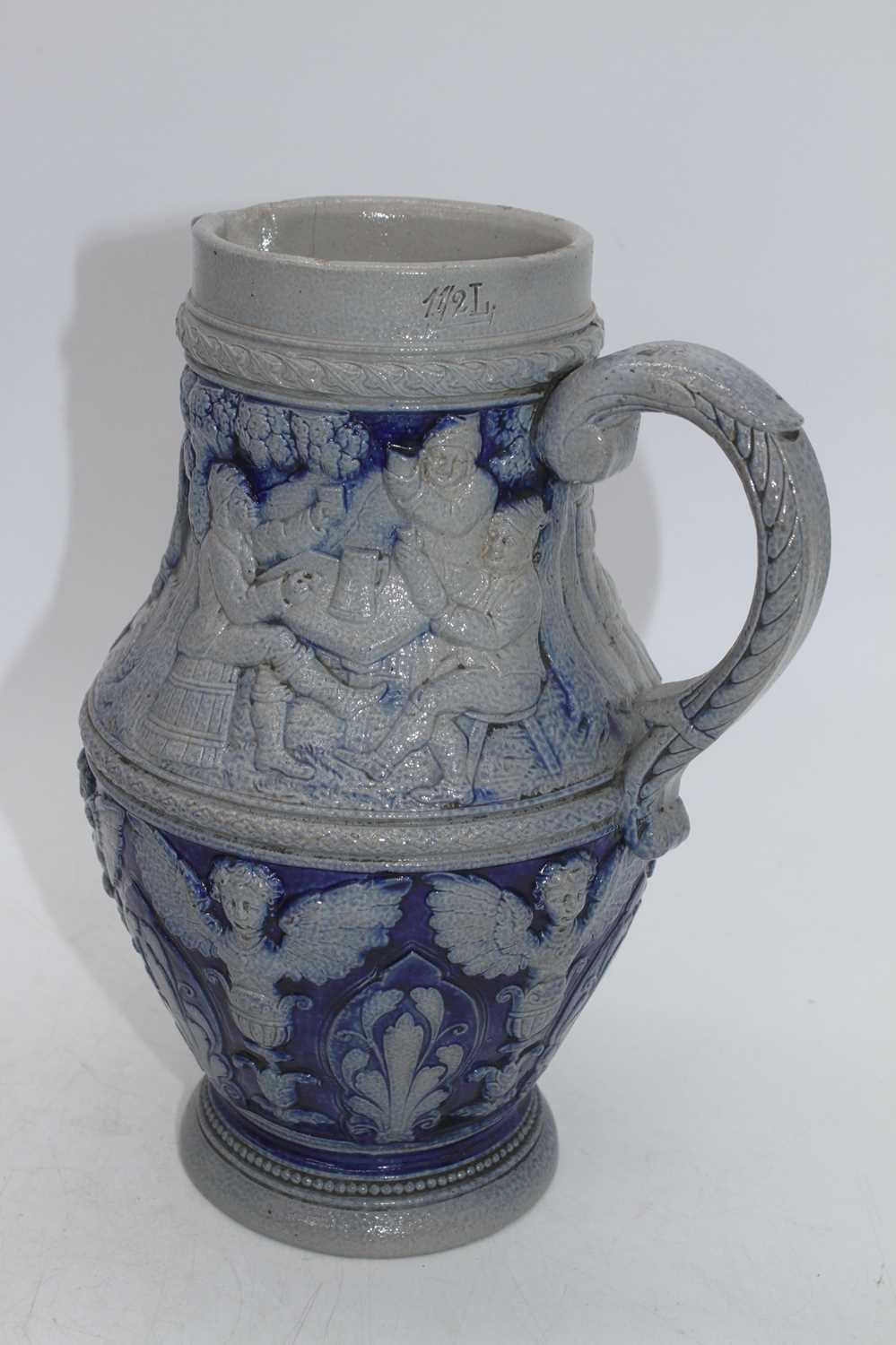 Two Rhineland stoneware jugs, each decorated with mythical creatures, the largest h.31cm - Bild 6 aus 6