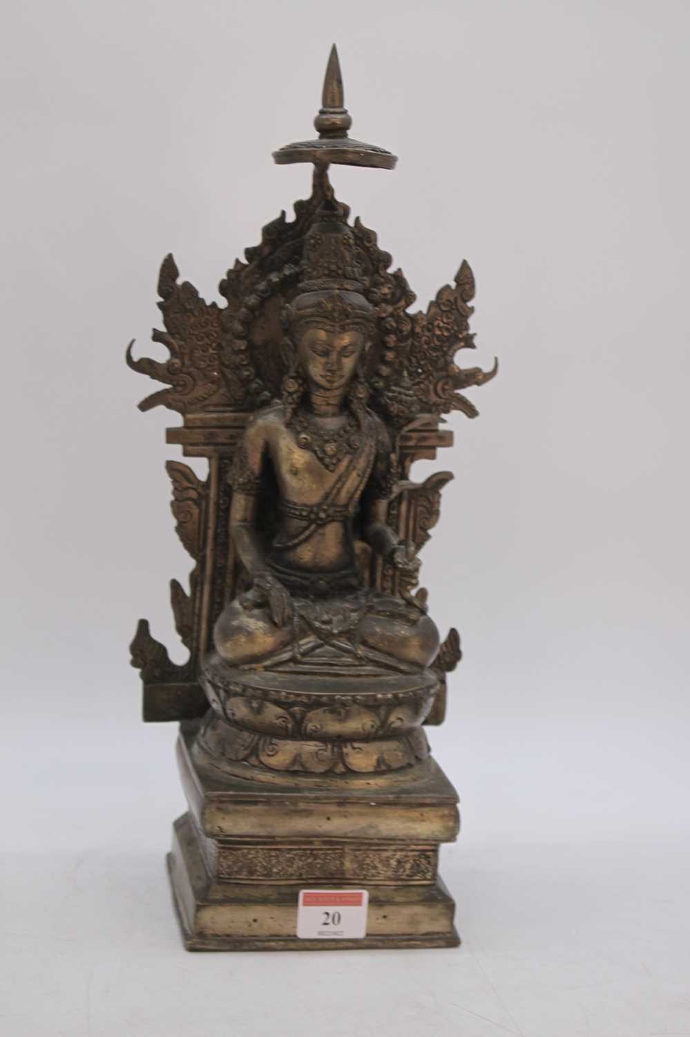 A 20th century Eastern metal figure of a seated deity, h.40cm