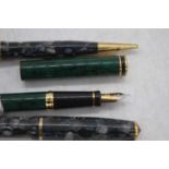 A Pelikan P70 Maxim fountain pen in marbled green, having gold trim and Iridium Point nib, 14cm;