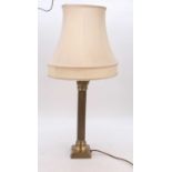 A modern brass table lamp, in the form of a Corinthian column, h.70cm (including shade)