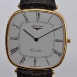 A yellow metal Longines quartz wristwatch, having cushion shaped white Roman dial and fitted to a