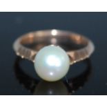 A rose metal pearl dress ring, set with an 8mm cultured pearl, size M½, gross weight 3.2g, not