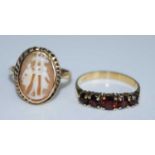 Two yellow metal dress rings, being a 9ct yellow gold oval shell cameo ring depicting the three
