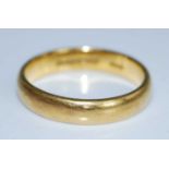 A 22ct gold 4mm court shaped wedding band, size P½, gross weight 5.7g, hallmarked 22ct, Birmingham