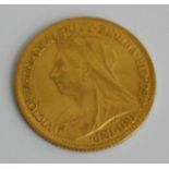 Great Britain, 1897 gold half sovereign, Victoria veiled bust, rev: St George and Dragon above date.