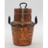 A late 19th century eastern copper container and cover having foliate engraved decoration with