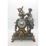 A late 19th century spelter mantel clock, surmounted by a figure of Diana the Huntress, the circular