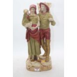 A large early 20th century Royal Dux figure group of a couple in standing pose, her with child in
