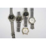 A collection of gent's quartz fashion watches (5)“Fashion” watches, not genuine makes.