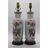 A pair of Chinese vases, each having a flared rim to a tapering neck and cylindrical body, enamel