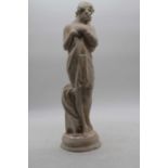 A large alabaster figure carved as a semi nude lady in standing pose, height 50cm (A/F)