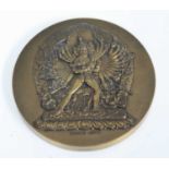 The Kalachakra medal, cast in bronze by The Paris Mint to commemorate Kalachakra Initiations, with